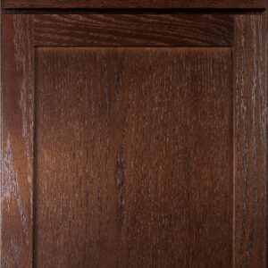 Close-up of a dark wood cabinet door with detailed grain and finish.