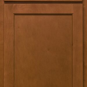 Warm wood kitchen cabinet with a raised panel door design.